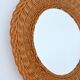 Vintage 1960s woven rattan mirror