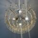 Brass chandelier with crystal pendants