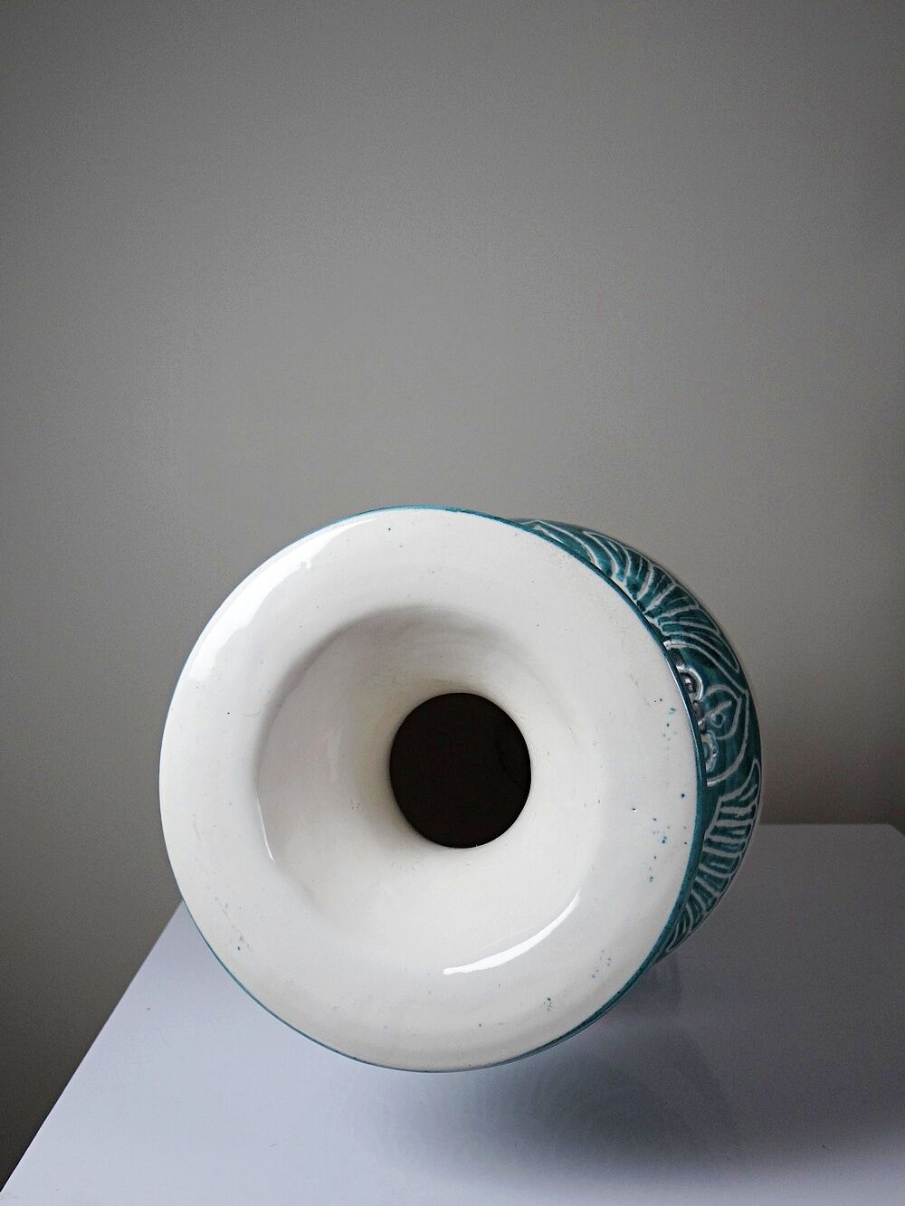 Vintage turquoise ceramic baluster vase with incised decoration.