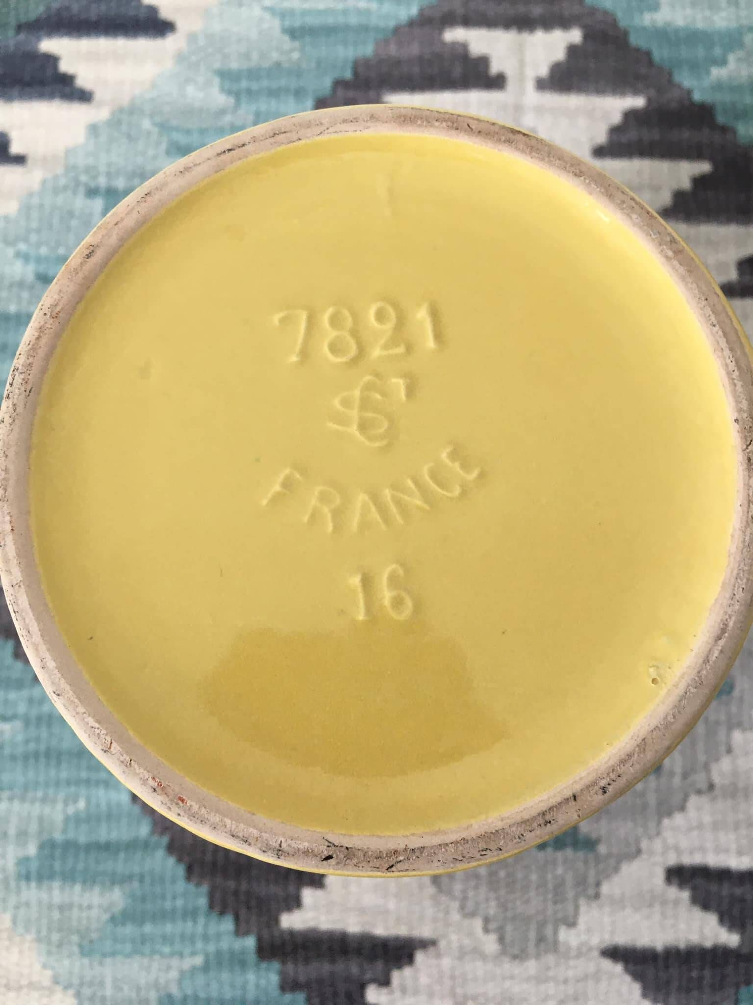 Pitcher or vase in yellow porcelain stamped Saint Clément France, numbered 7821