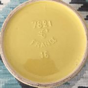 Pitcher or vase in yellow porcelain stamped Saint Clément France, numbered 7821