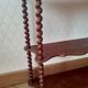 Turned wooden wall shelf