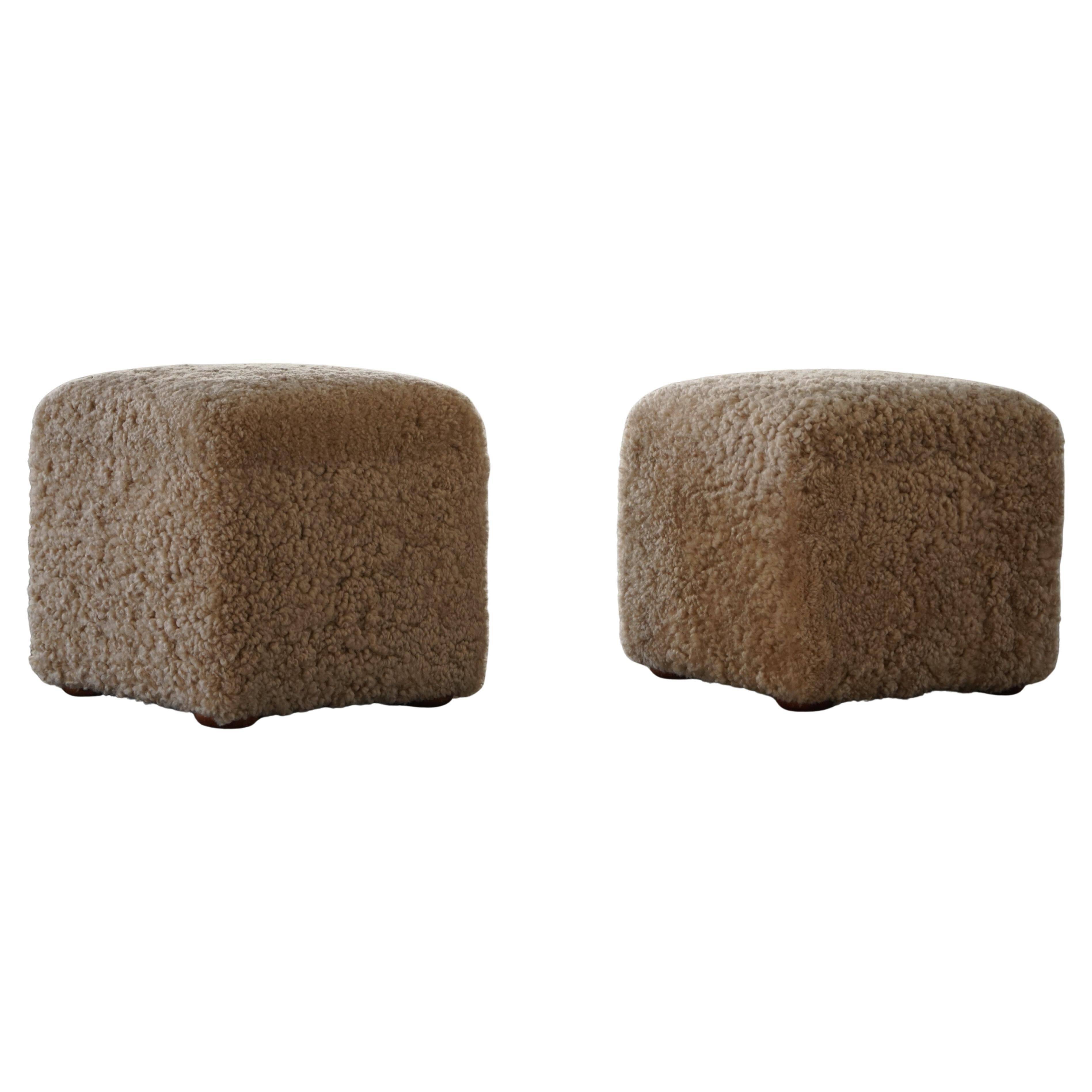 French mid-century cube poufs, a pair of lambswool stools, 1960s.