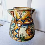 Antique majolica water pitcher made in Italy and hand painted.