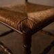 Chaise vintage à dossier ajouré et assise en jonc · 42×42×68 cm