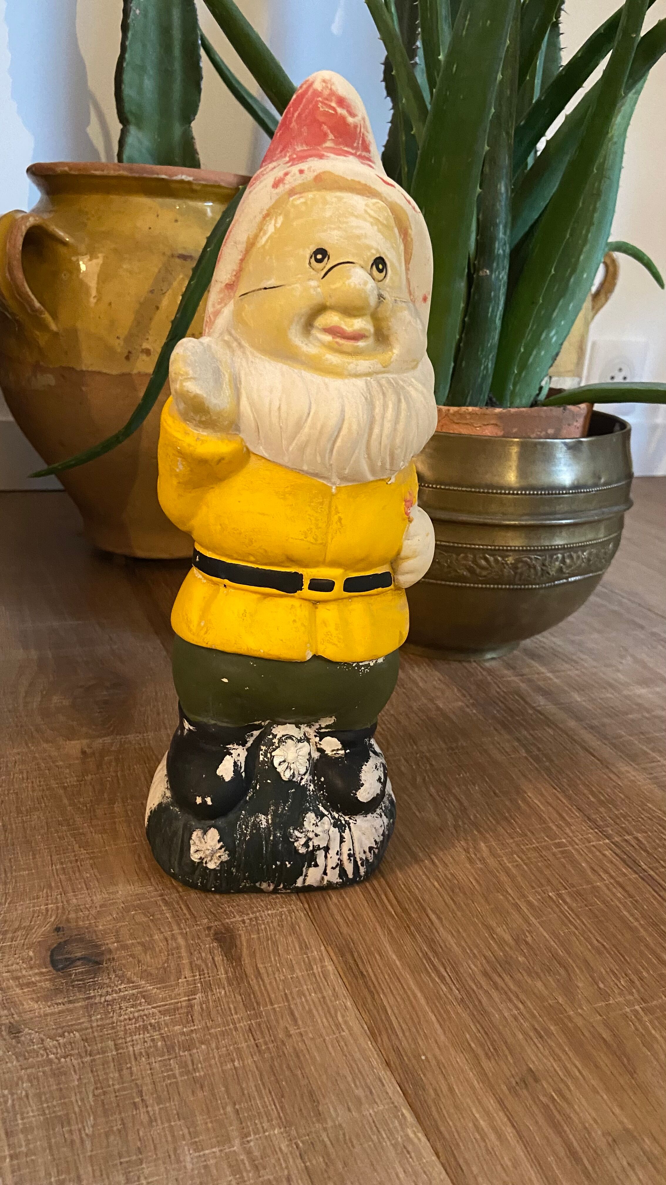 Ancient terracotta garden gnome