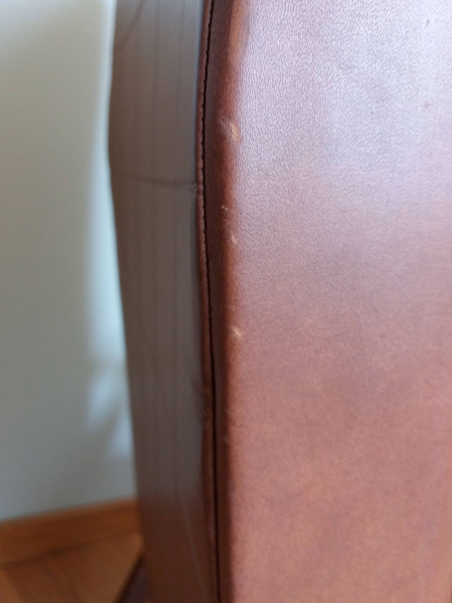 Scandinavian brown skai and wood armchair