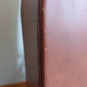 Scandinavian brown skai and wood armchair