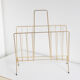 Vintage magazine holder in gold metal