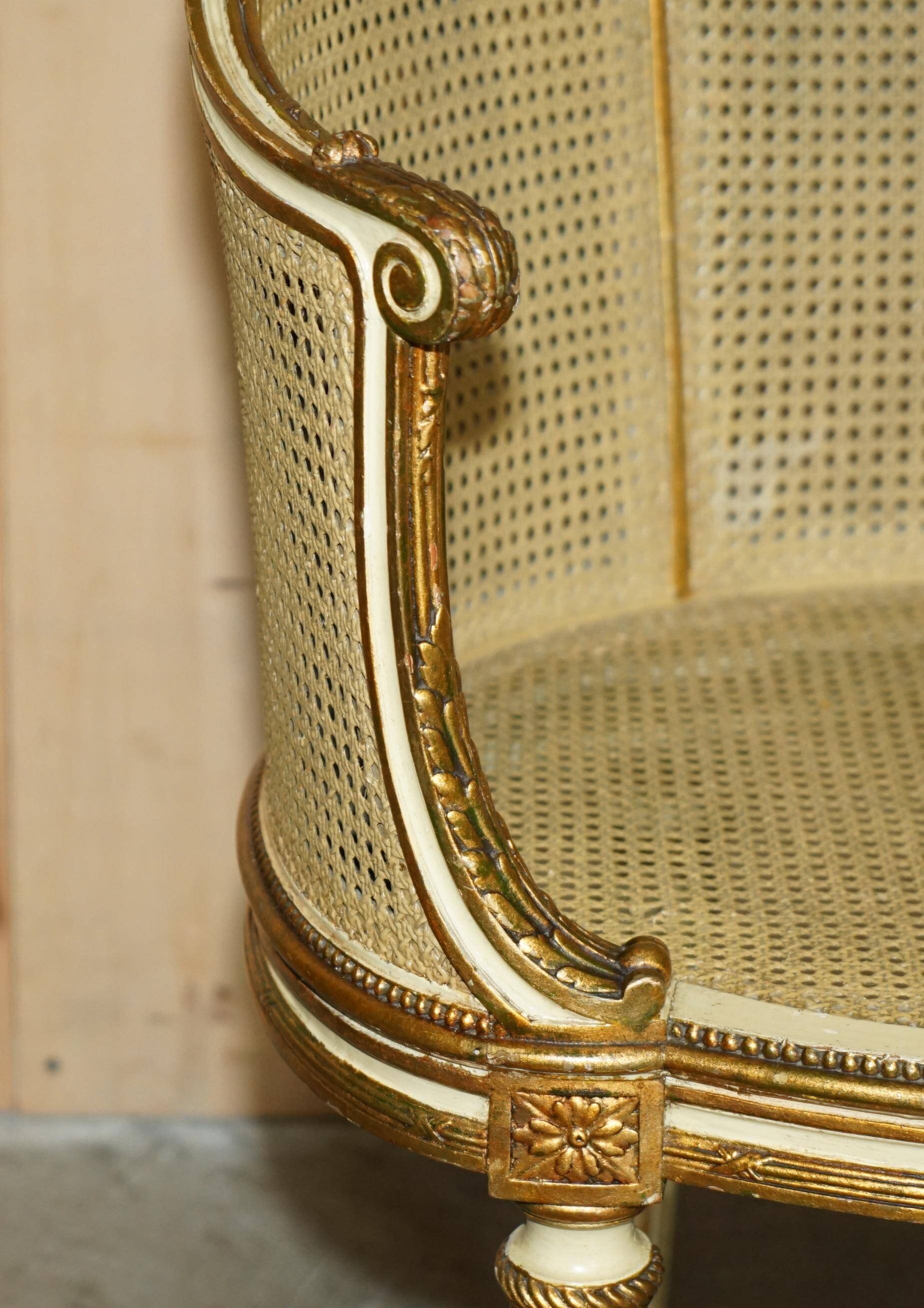 Louis XVI Bergère canapé in gilded wood with double caning