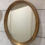 Golden oval mirror 26x32cm