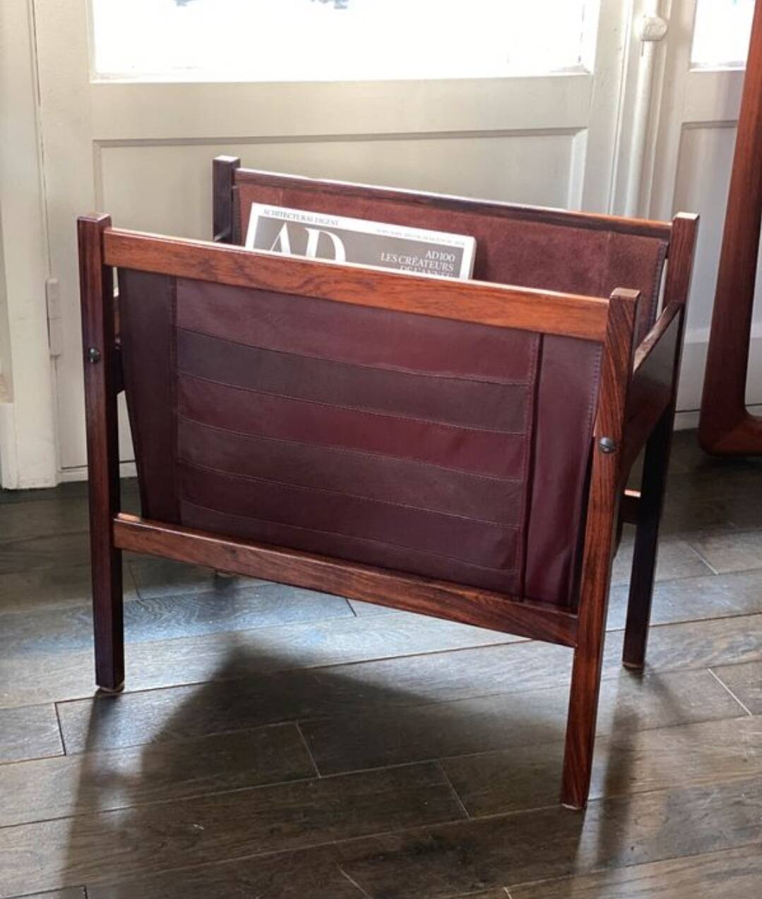Scandinavian magazine rack/vinyl rack in Rio rosewood and leather by Torbjørn Afdal