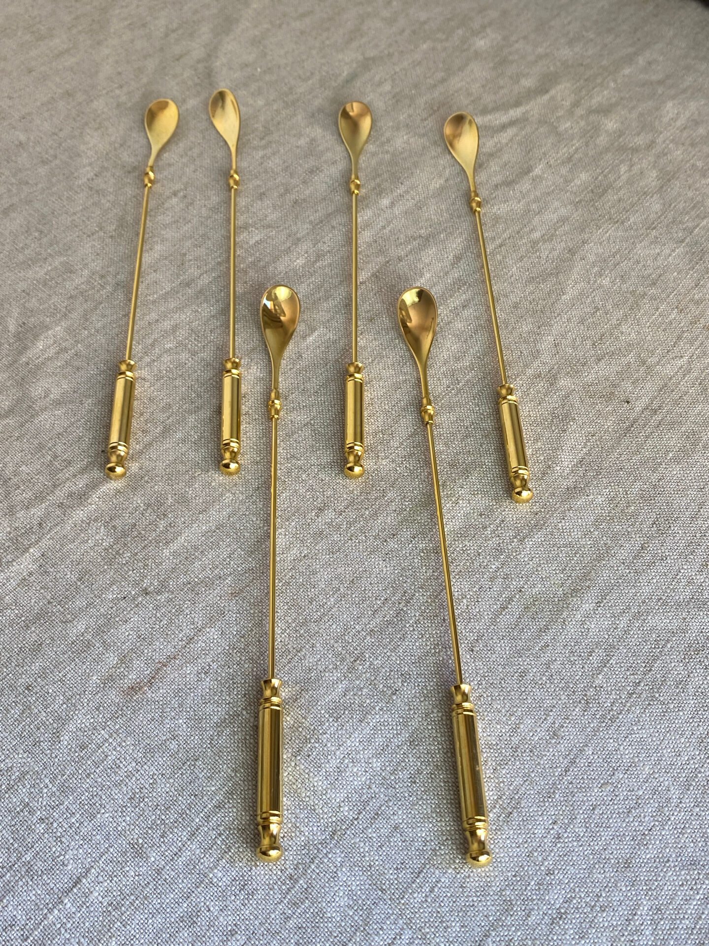 Long coffee or cocktail spoons in gold plating