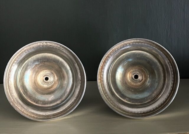 Pair of Christofle silver metal candle holders.