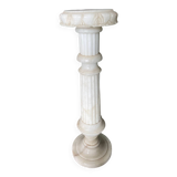White marble column – sculpted base