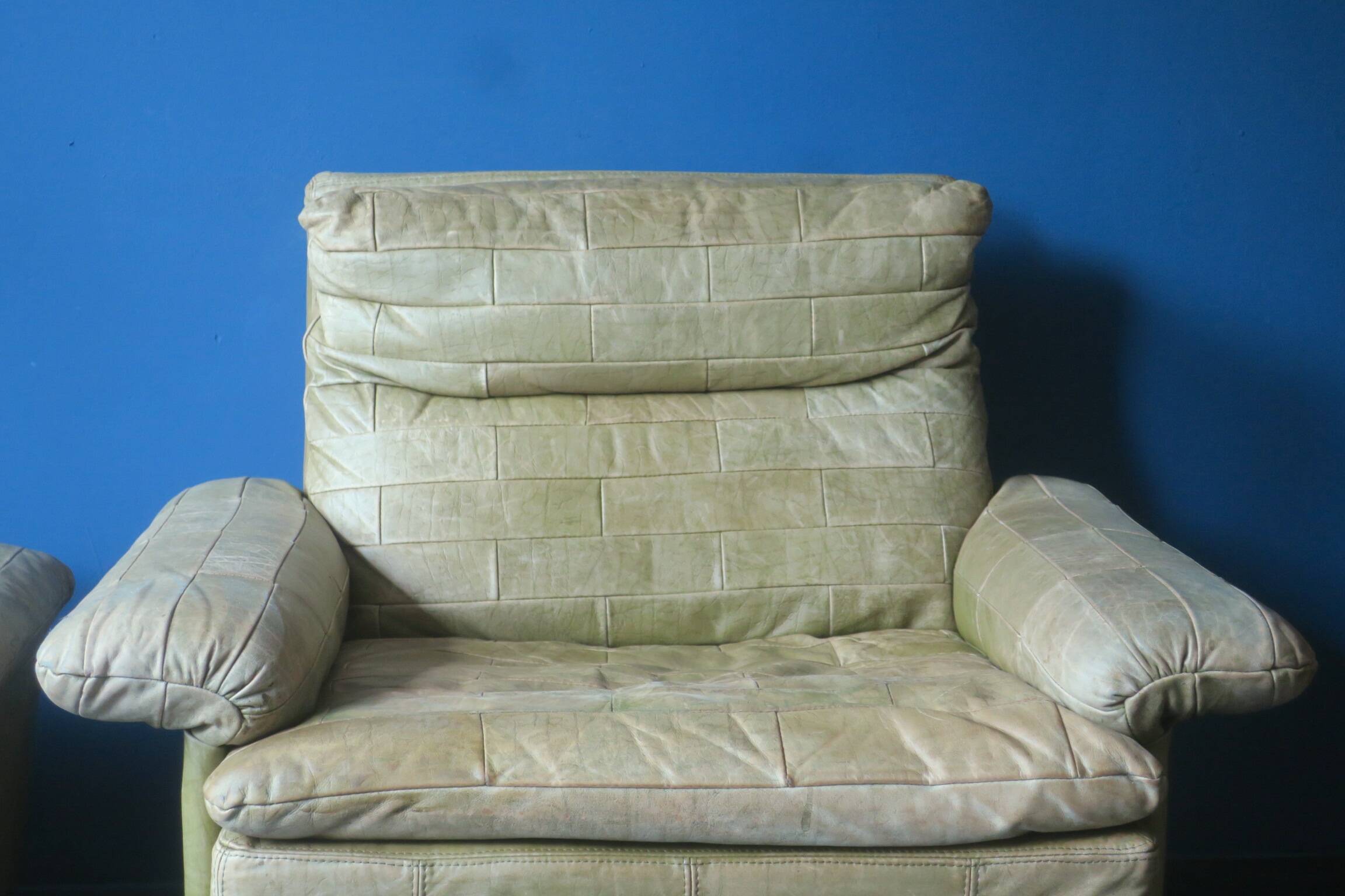 Patchwork leather olive green lounge chair and ottoman by Laauser, 1970s