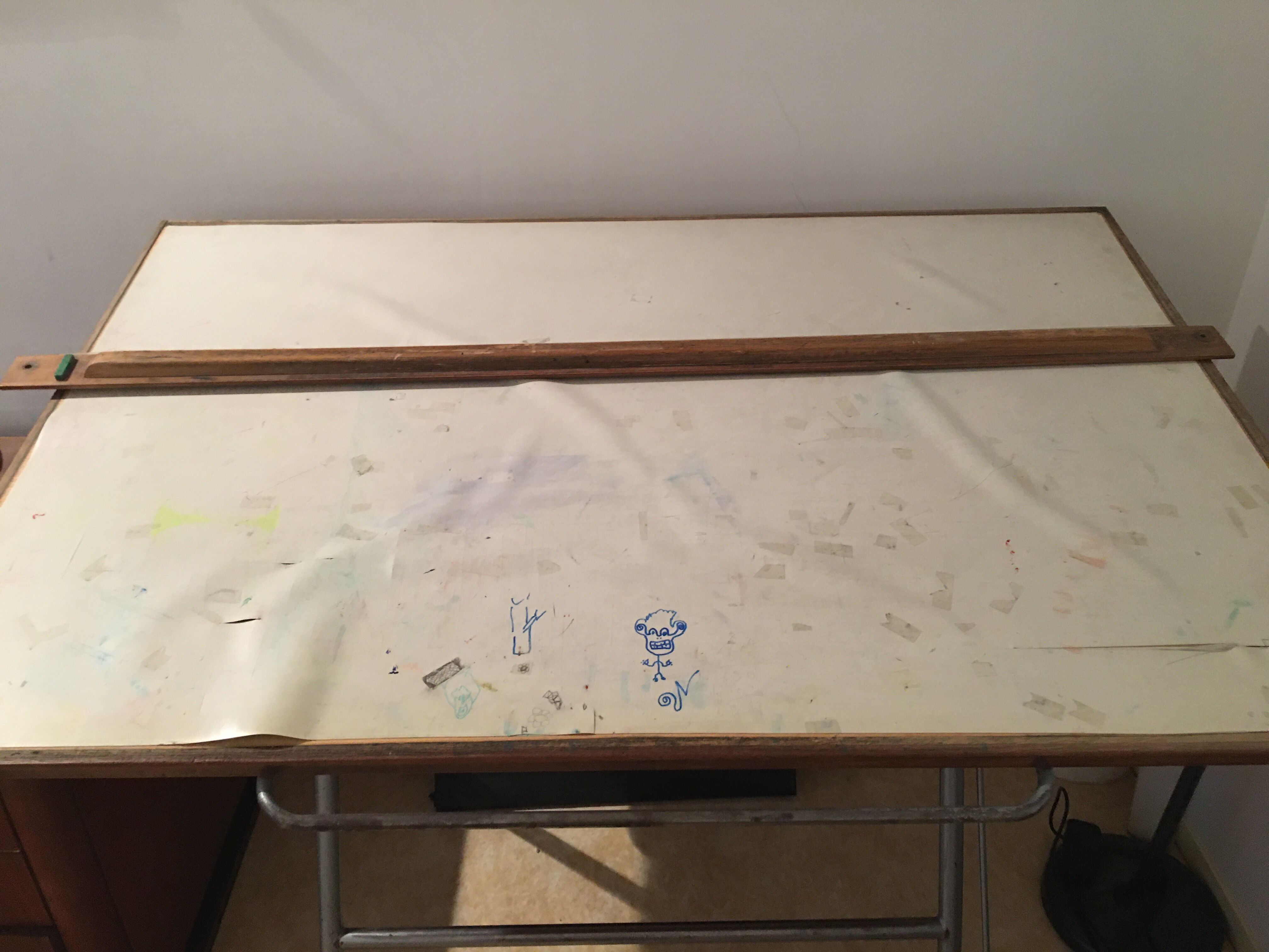 Architect drawing table with ruler