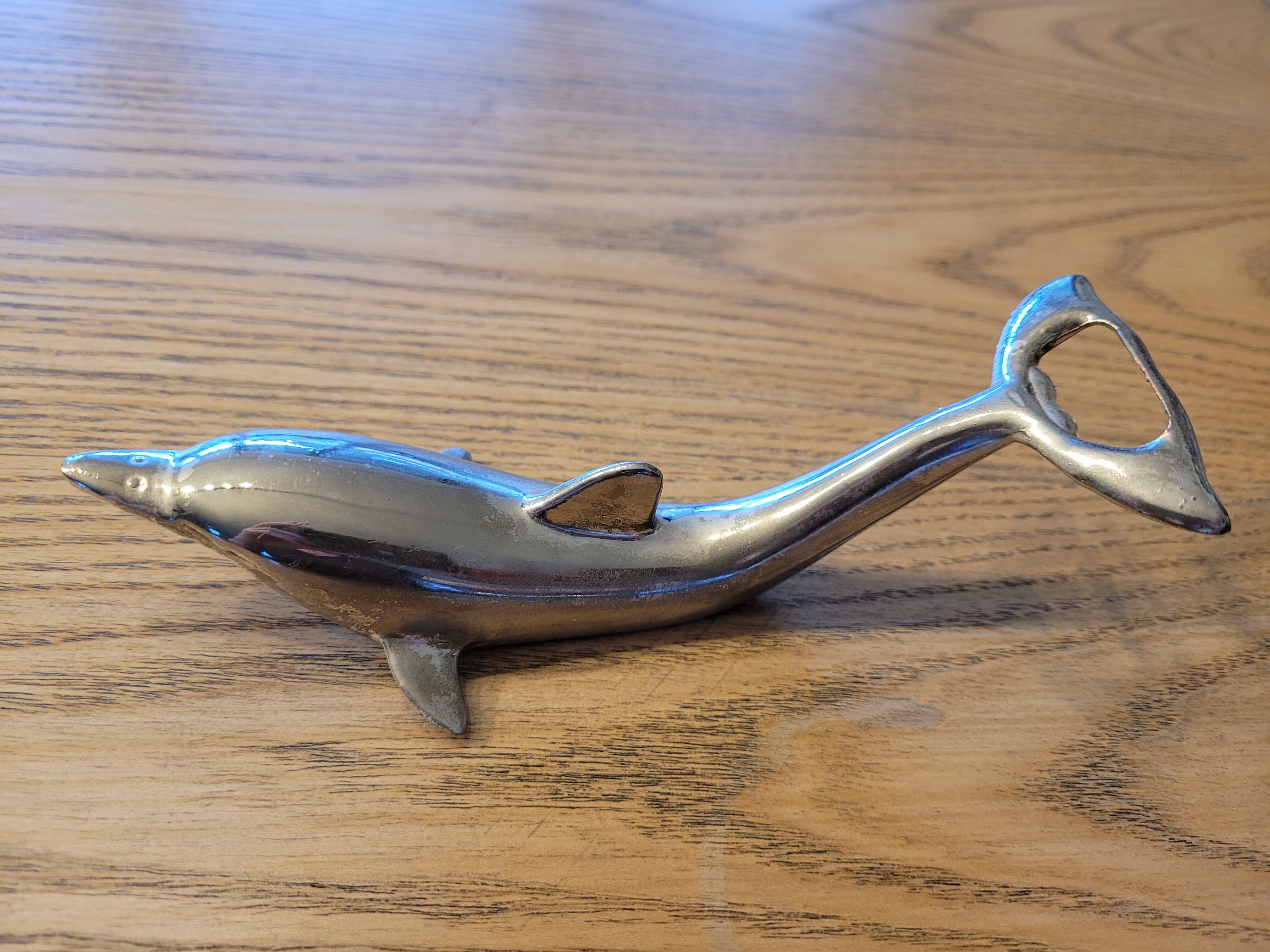 Silver dolphin bottle opener