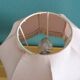 Turned wood bedside lamp with fabric lampshade