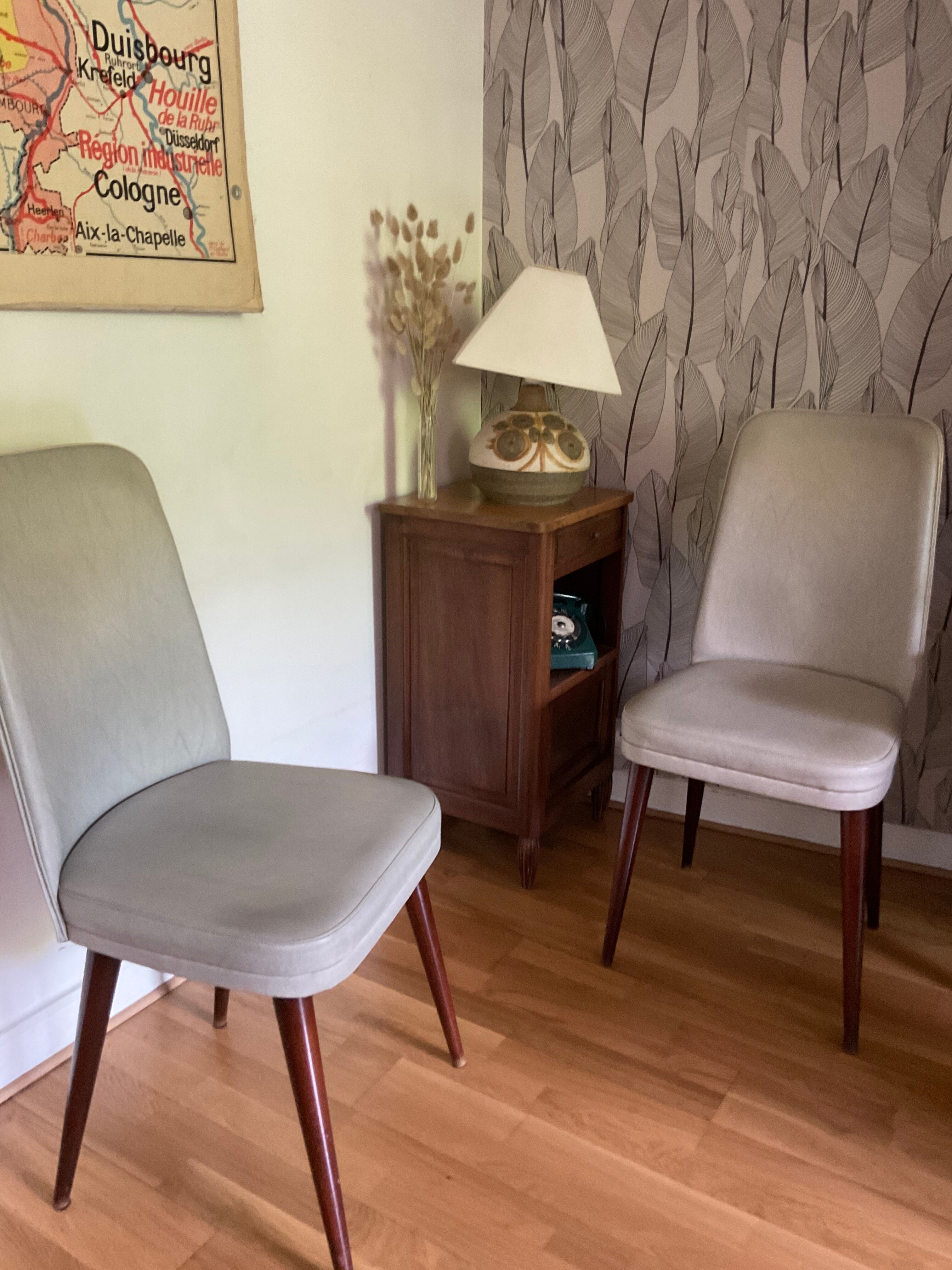 Pair of vintage mahogany and skai chairs