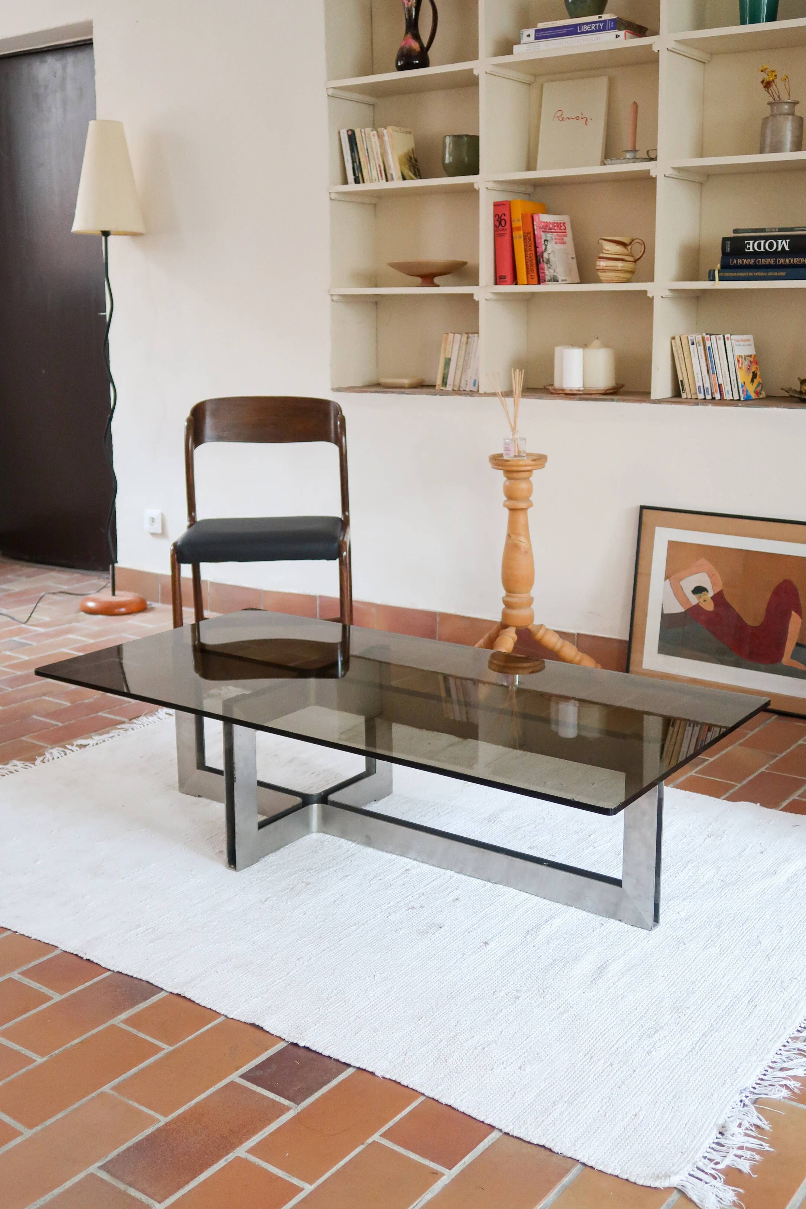Smoked glass coffee table, brushed stainless steel base, 1970s.