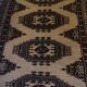 Vintage rug with oriental and geometric patterns, fringes, 63 × 90 cm