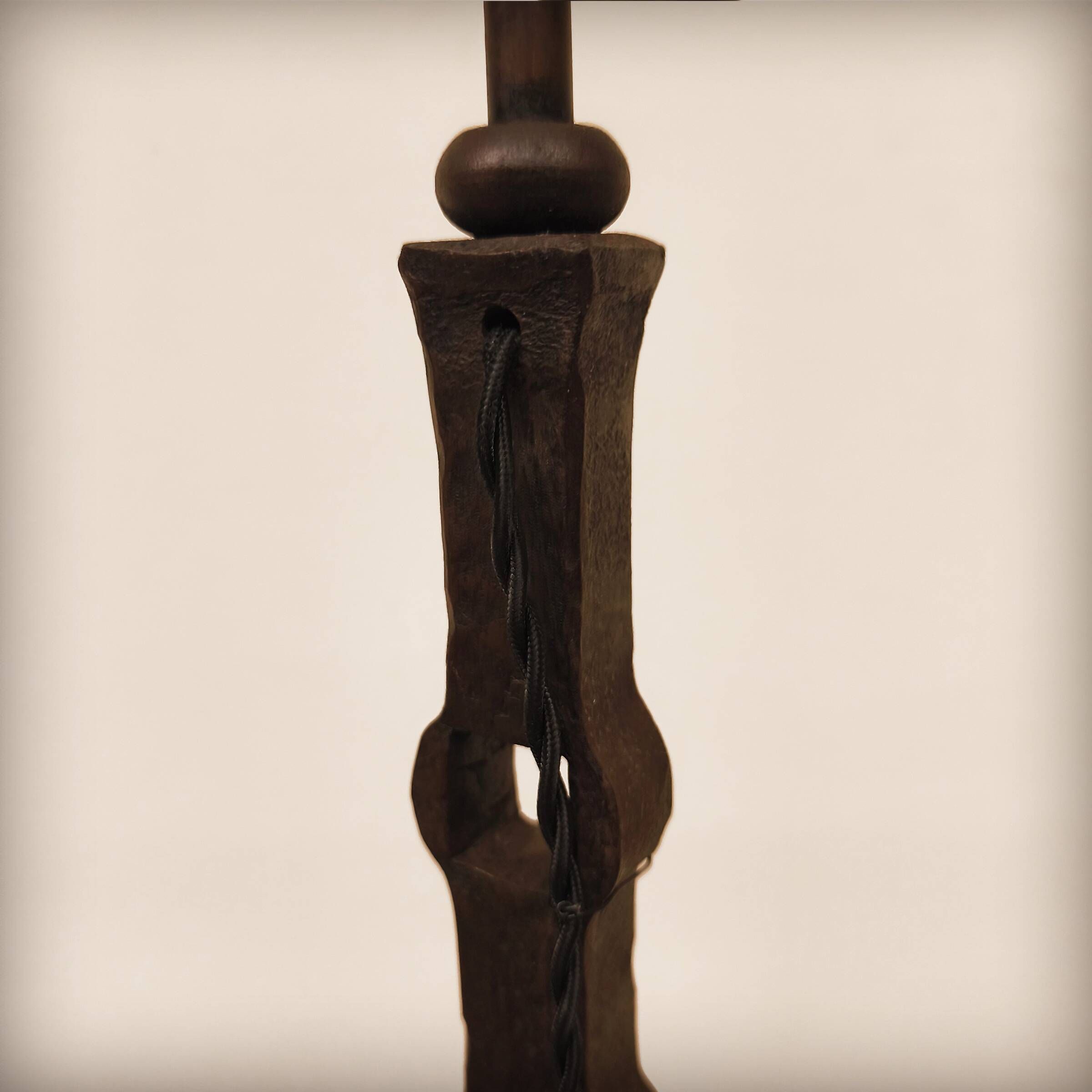 Brutalist lamp base in wrought and beaten iron, France, 1920 to 1960.