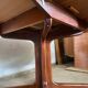 Table ronde dia 116cm extensible type Scandinave en teck et placage de teck an 1960