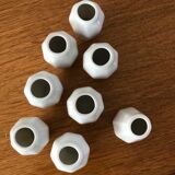 8 miniature vases in white earthenware