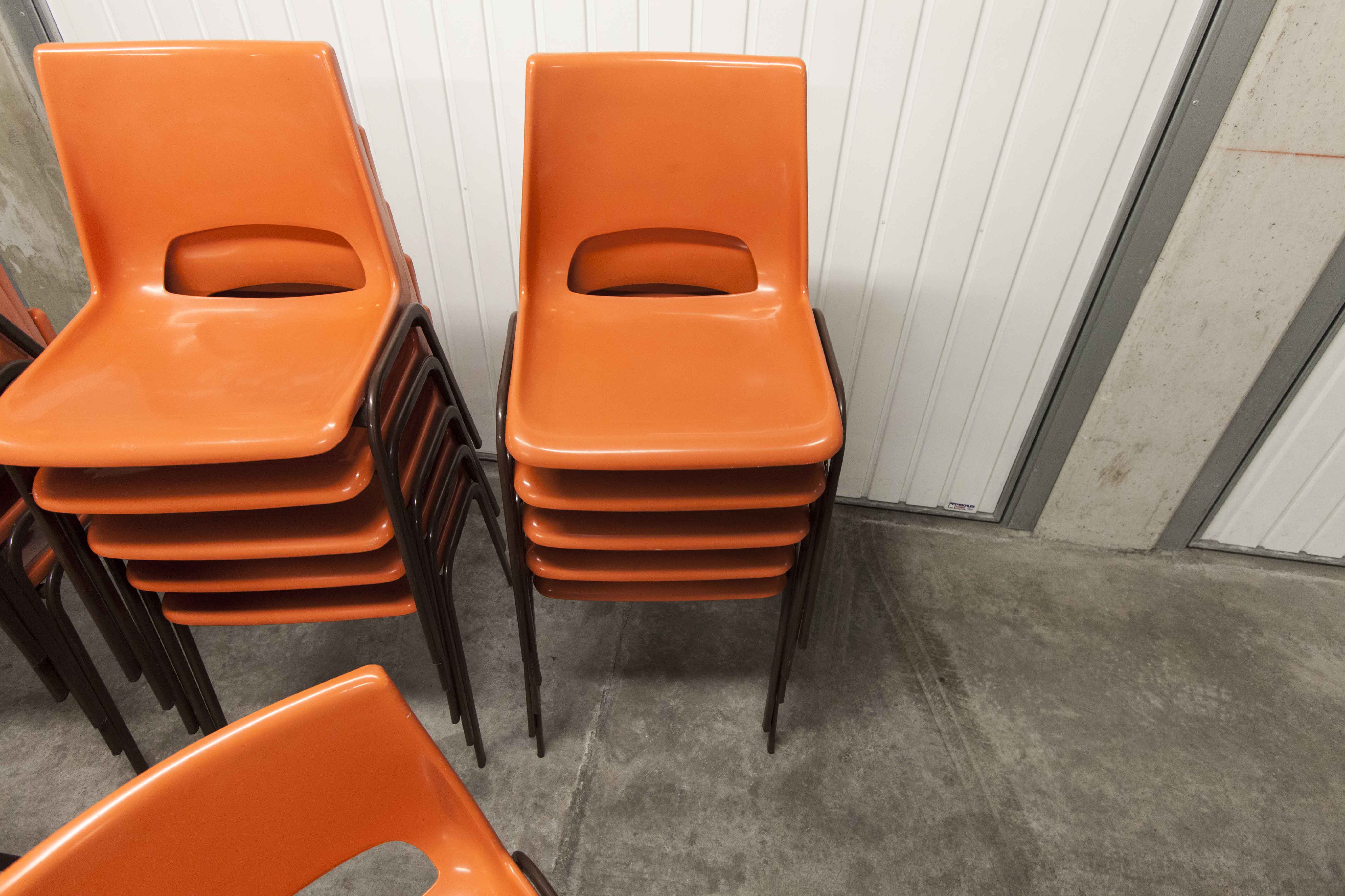 Set of 17 vintage orange chairs 1970