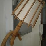 Rattan wall sconce