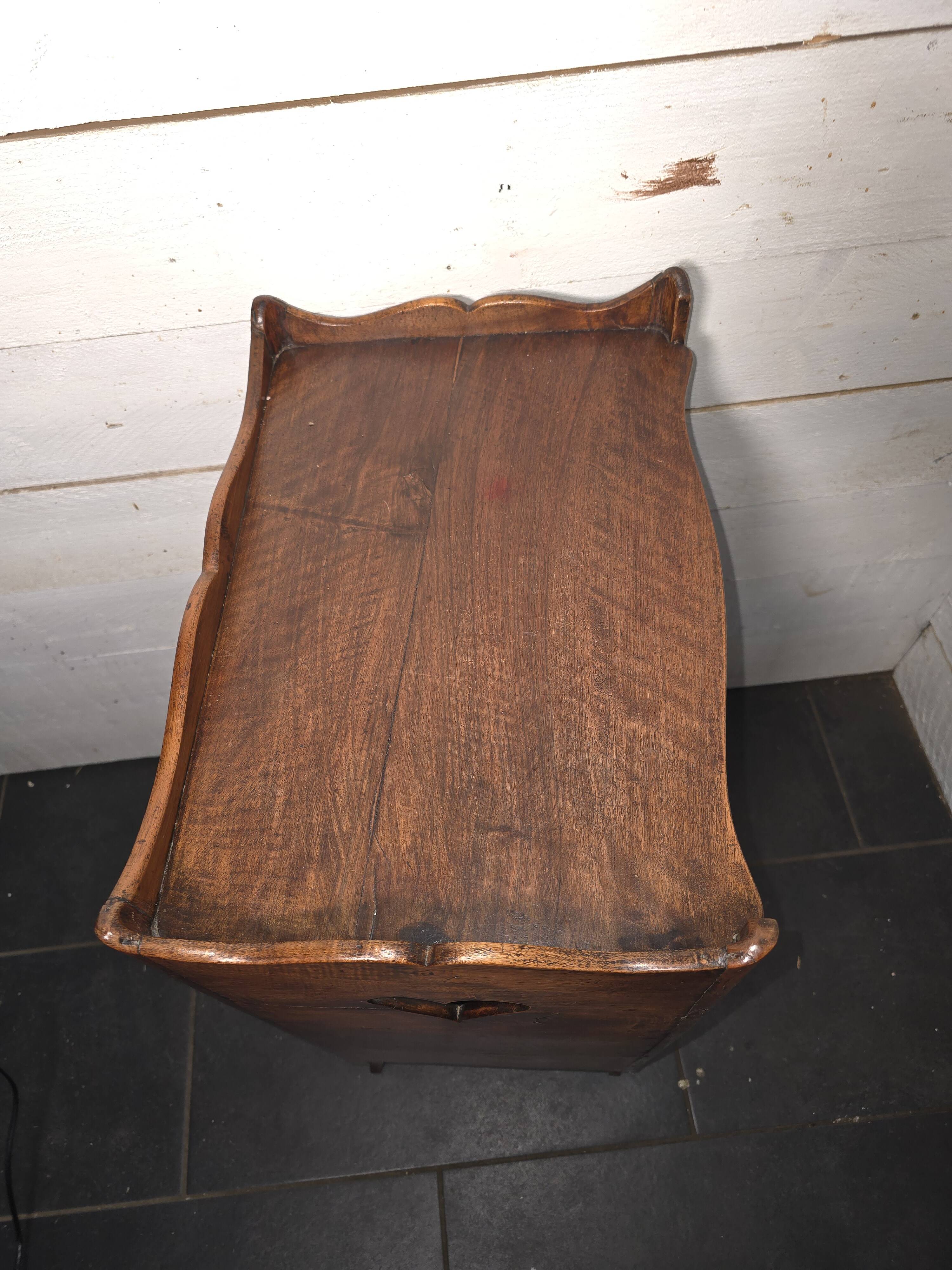 Open library in Louis XV style made of walnut.