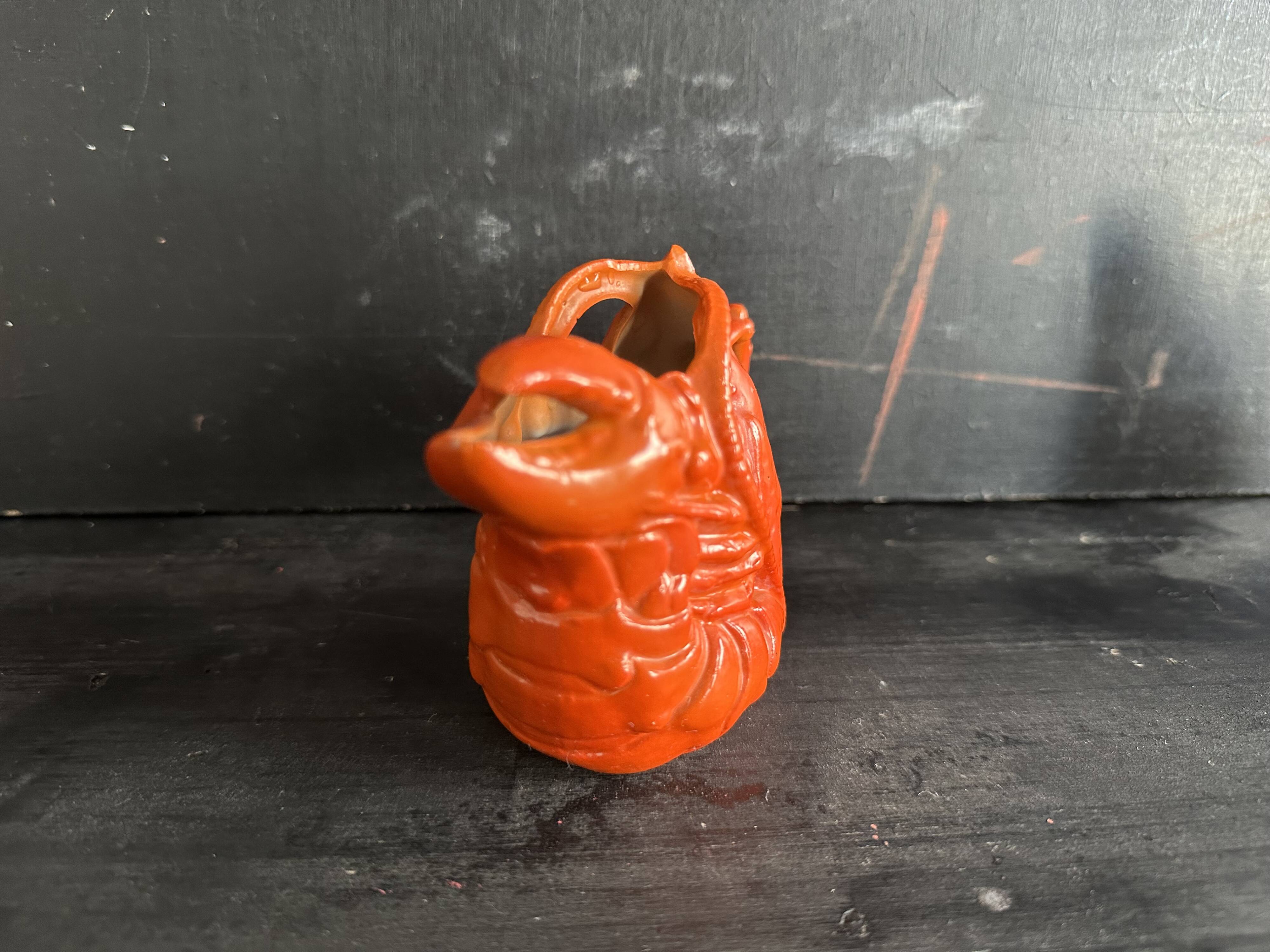 Antique ceramic lobster pitcher from the early 20th century.