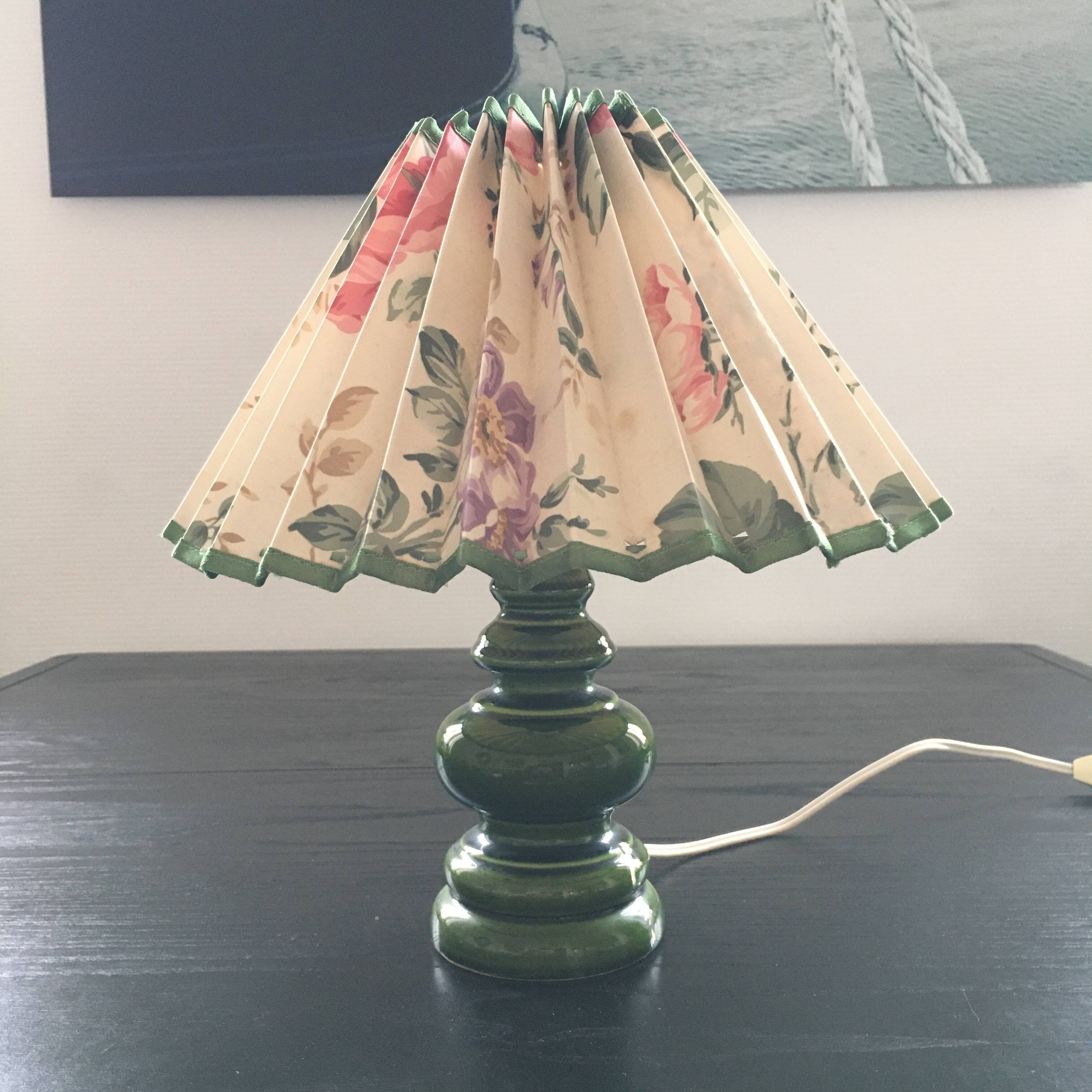 Green ceramic lamp and flowered lampshade