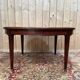 Extendable oval table in Louis XVI style – Mottled mahogany – 19th century