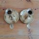 Duo of gilded brass cellar rat candlesticks