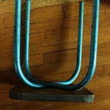 Industrial stool sitting wood feet metal blue metal feet