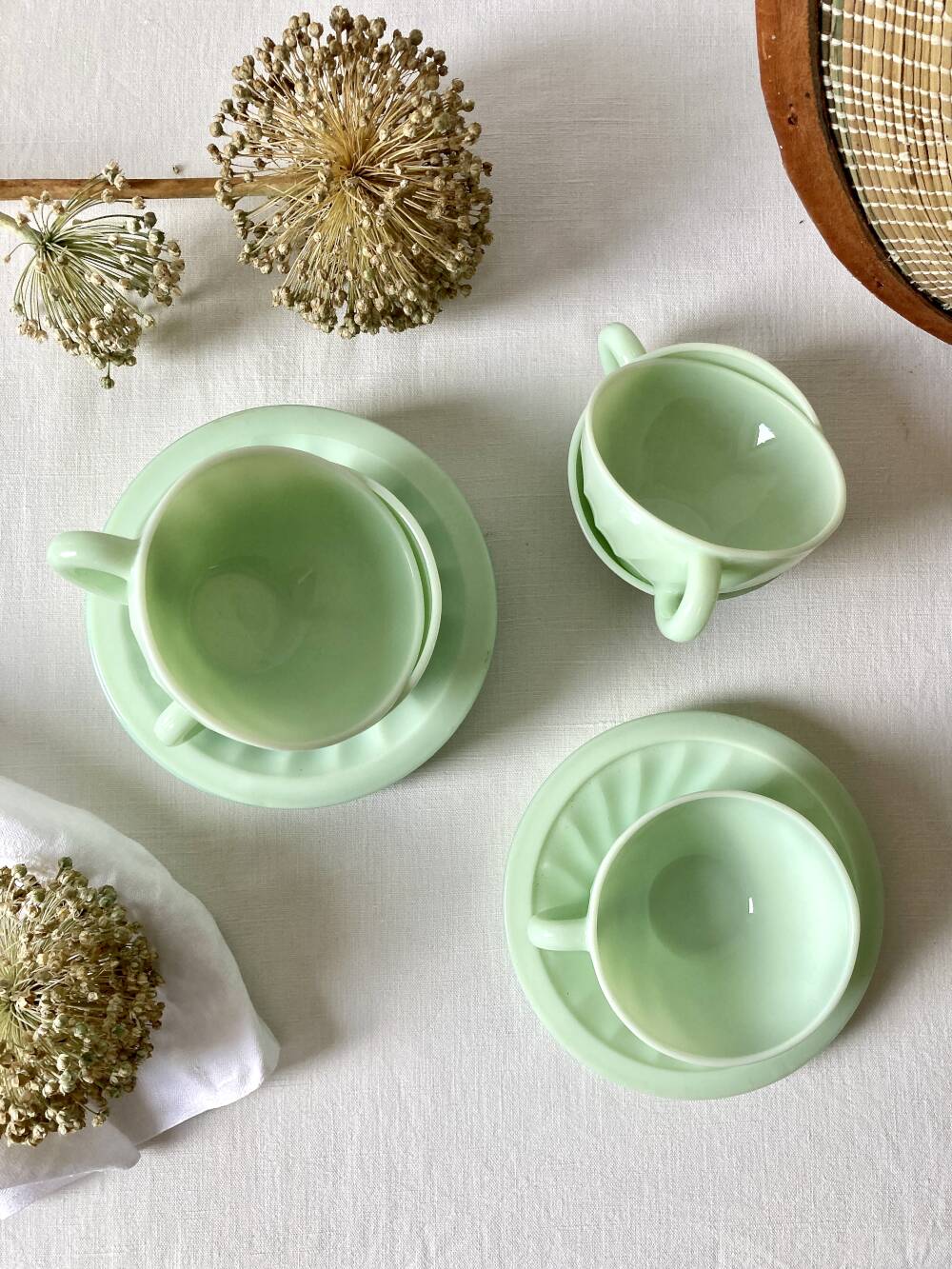 Pressed glass cups and saucers, 1950s