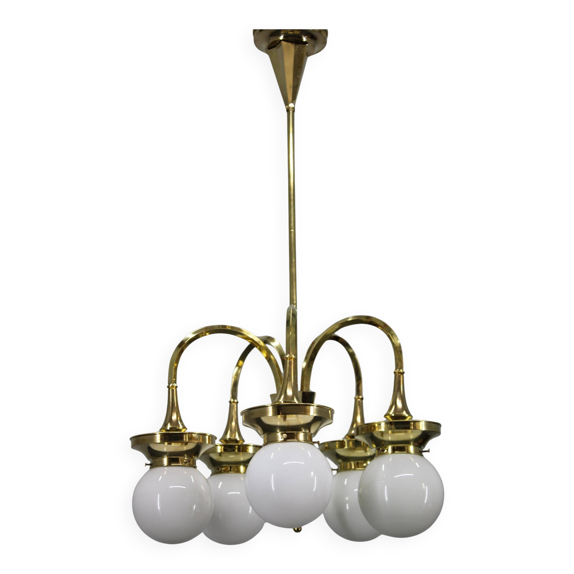 1930s Czechoslovak Art Deco brass chandelier with five opaline glass globes