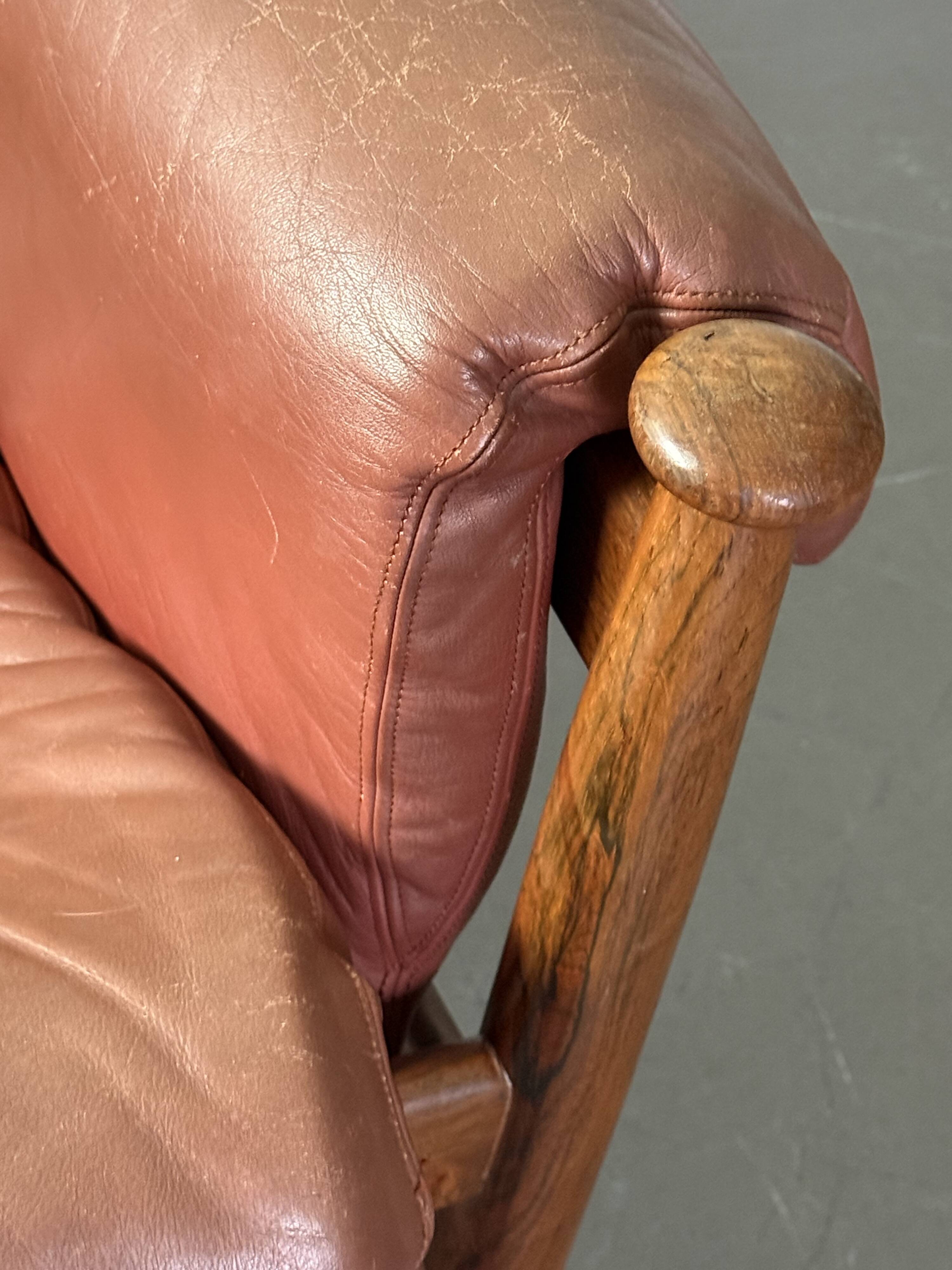 Admiral armchair by Eric Merthen, in leather and rosewood