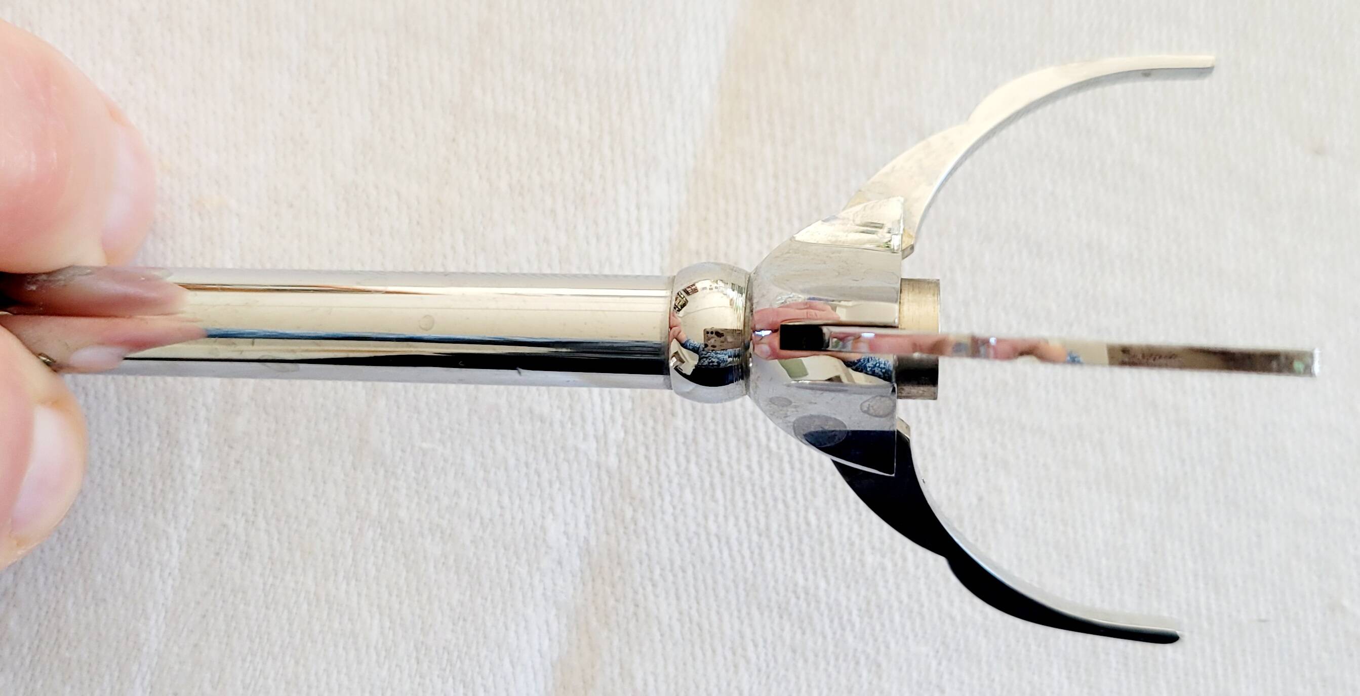 Glass sugar bowl with its tongs
