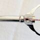Glass sugar bowl with its tongs