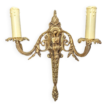 Bronze wall sconce in Empire style