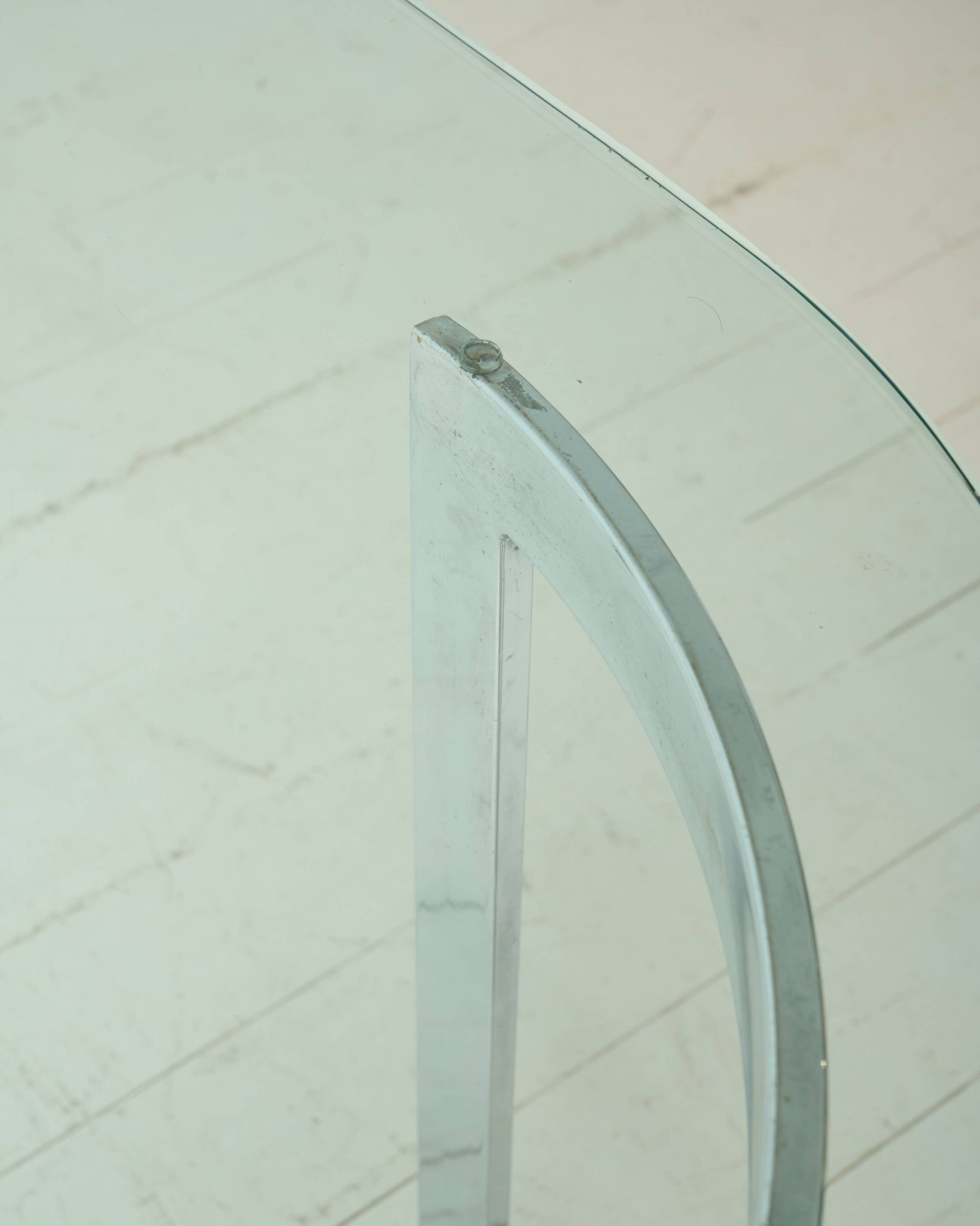 Dining table with a circular base.