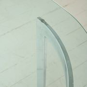 Dining table with a circular base.