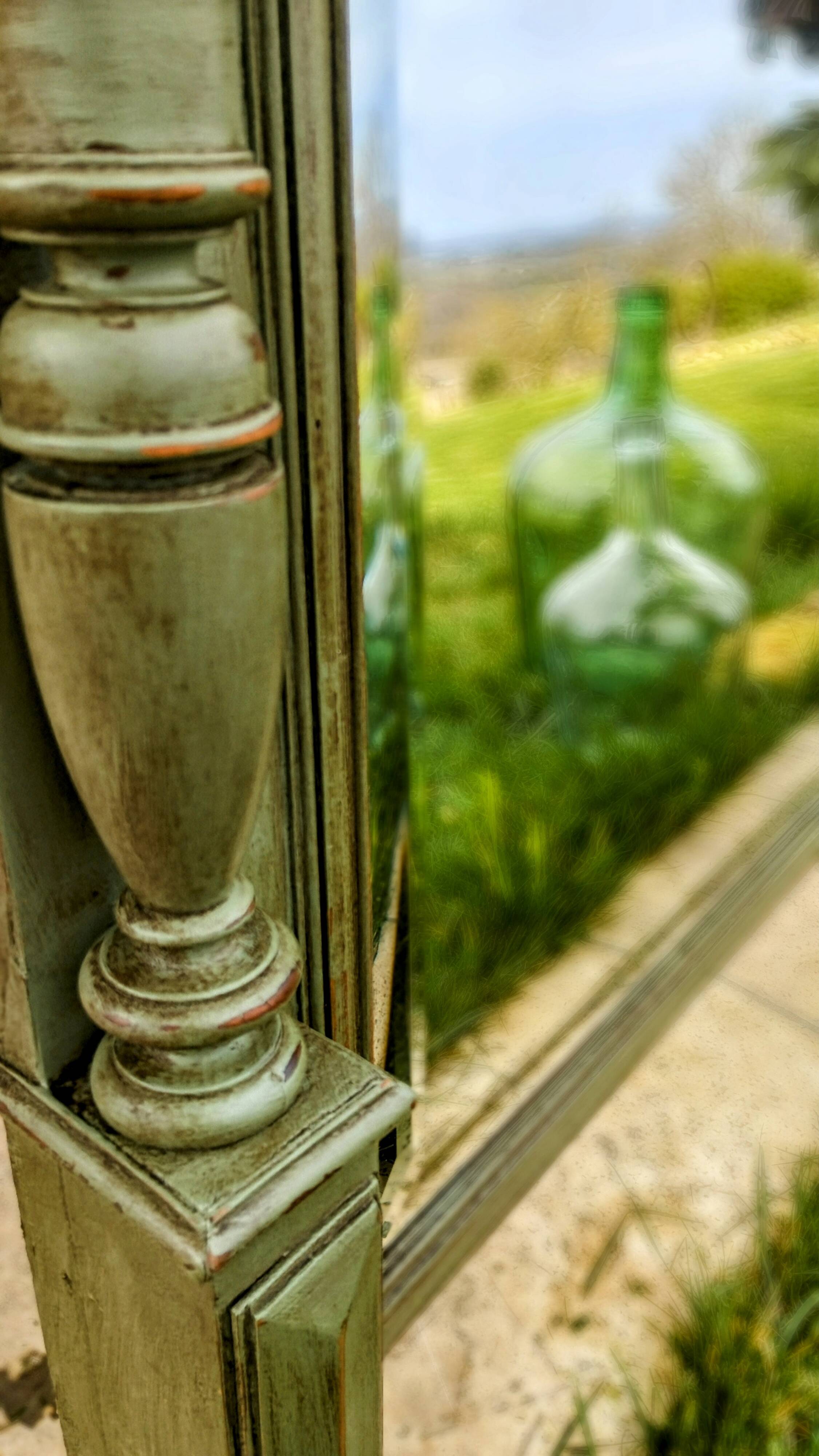 Antique olive green mirror