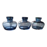 3 blue glass vases