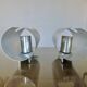 Pair of "oxar" brushed metal wall lights, space age, 1970