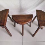 Trio of vintage brutalist tripod stools