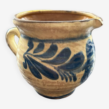 Pitcher with blue floral decor